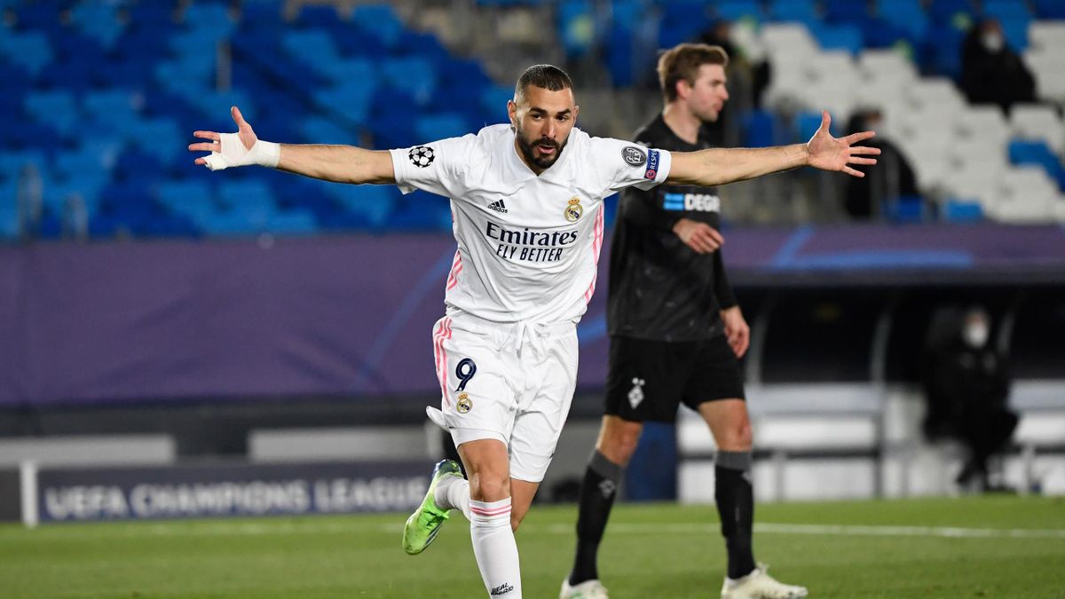 Benzema double fires Real Madrid into Champions League last 16