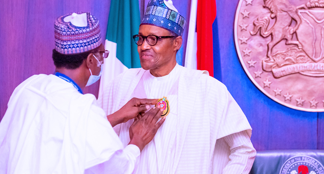 President Buhari Praises Military For Maintaining Unity In Nigeria; Launches Armed Forces Emblem