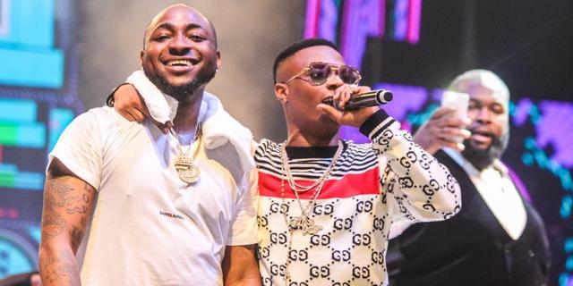 Davido And Wizkid Seen Hugging Each Other At Nightclub In Lagos