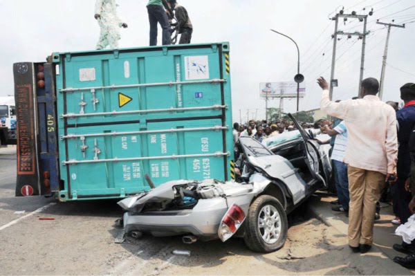 Dozens Trapped As Container Falls On Three Vehicles In Lagos