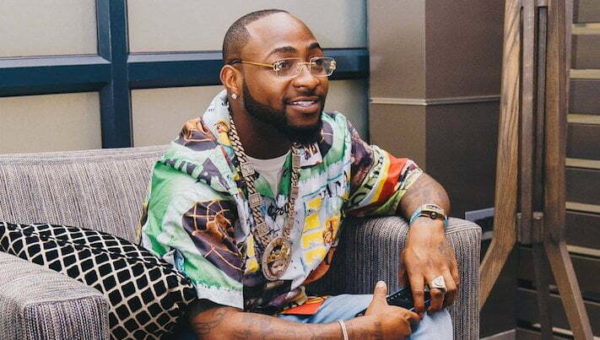 Davido Gifts Fan Shoes, N2m On Stage