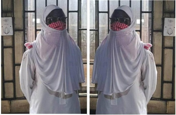 Lagos Police Rescue Suspected Terrorist Dressed In Hijab From Mob